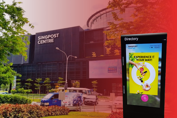 Digital wayfinding kiosk in front of the SingPost Centre in Singapore, showcasing the interactive ViaDirect directory used by mall visitors.