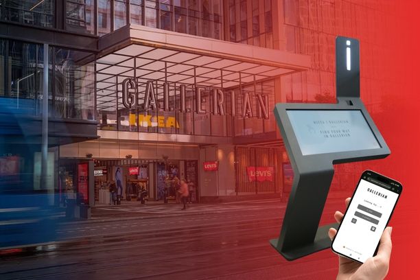 Interactive wayfinding kiosk and mobile map at The Gallerian shopping center in Stockholm, allowing visitors to navigate stores and services using digital kiosks or QR code-based mobile wayfinding.