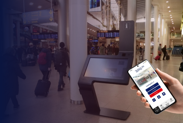 Digital wayfinding kiosk and mobile navigation guiding passengers inside an airport terminal.