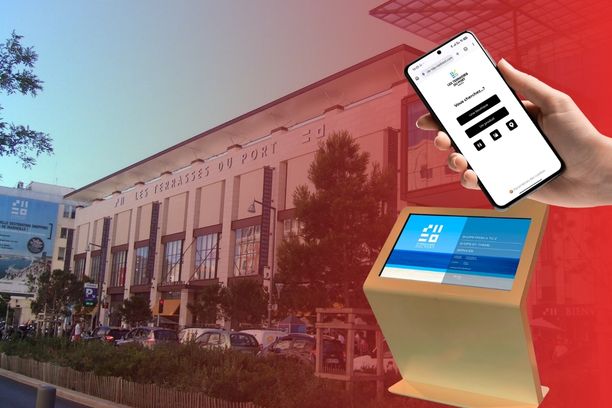 Les Terrasses du Port shopping centre in Marseille with a ViaDirect multitouch kiosk and mobile wayfinding interface in the foreground.