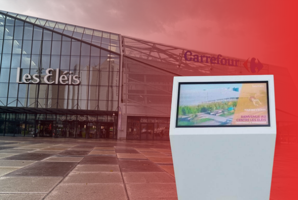 Interactive wayfinding kiosk displayed in front of Carrefour Les Eléis shopping center in Cherbourg, France