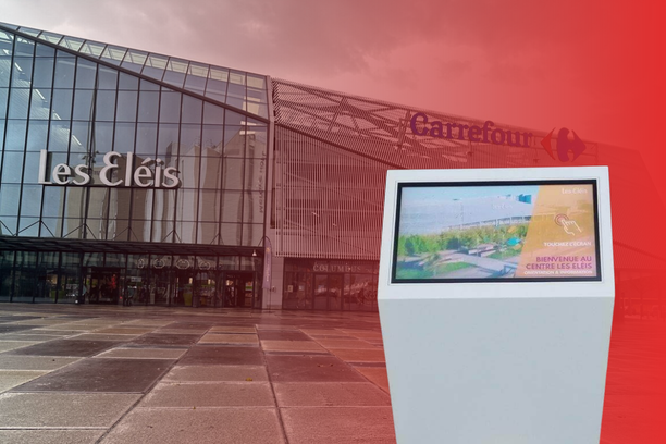 Interactive wayfinding kiosk displayed in front of Carrefour Les Eléis shopping center in Cherbourg, France