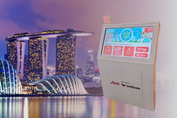 Interactive digital wayfinding kiosk by ViaDirect in a Singapore commercial venue, providing 3D indoor navigation and QR code mobile wayfinding.