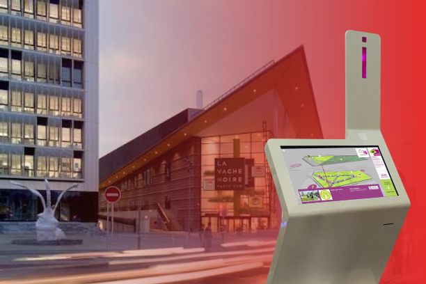 Custom ViaDirect interactive wayfinding kiosk with 3D map alongside the exterior of La Vache Noire shopping center.
